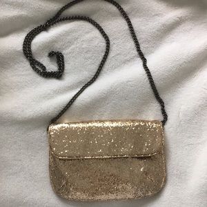 Gold sparkle clutch